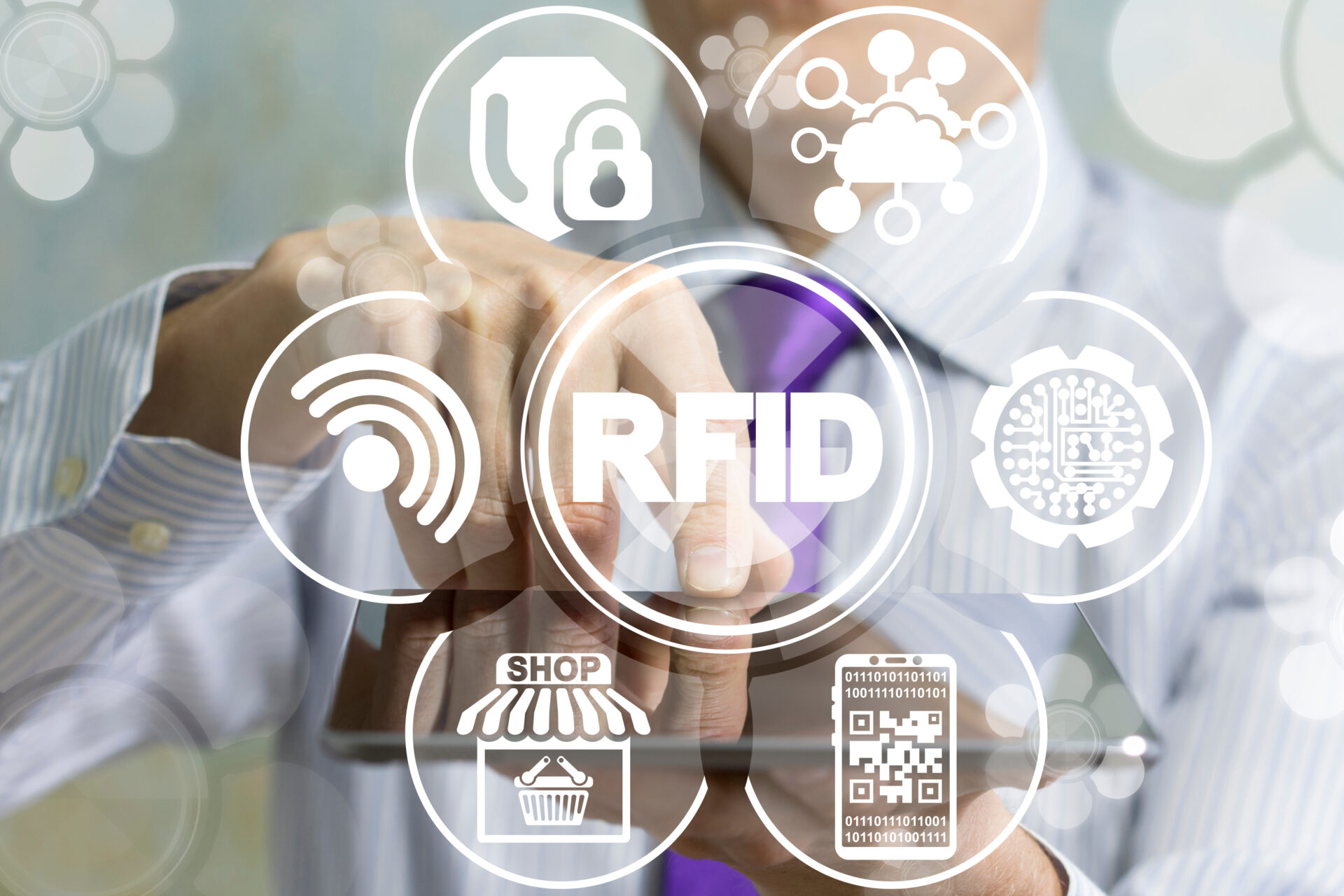 Man in tie pointing to RFID in image overlay
