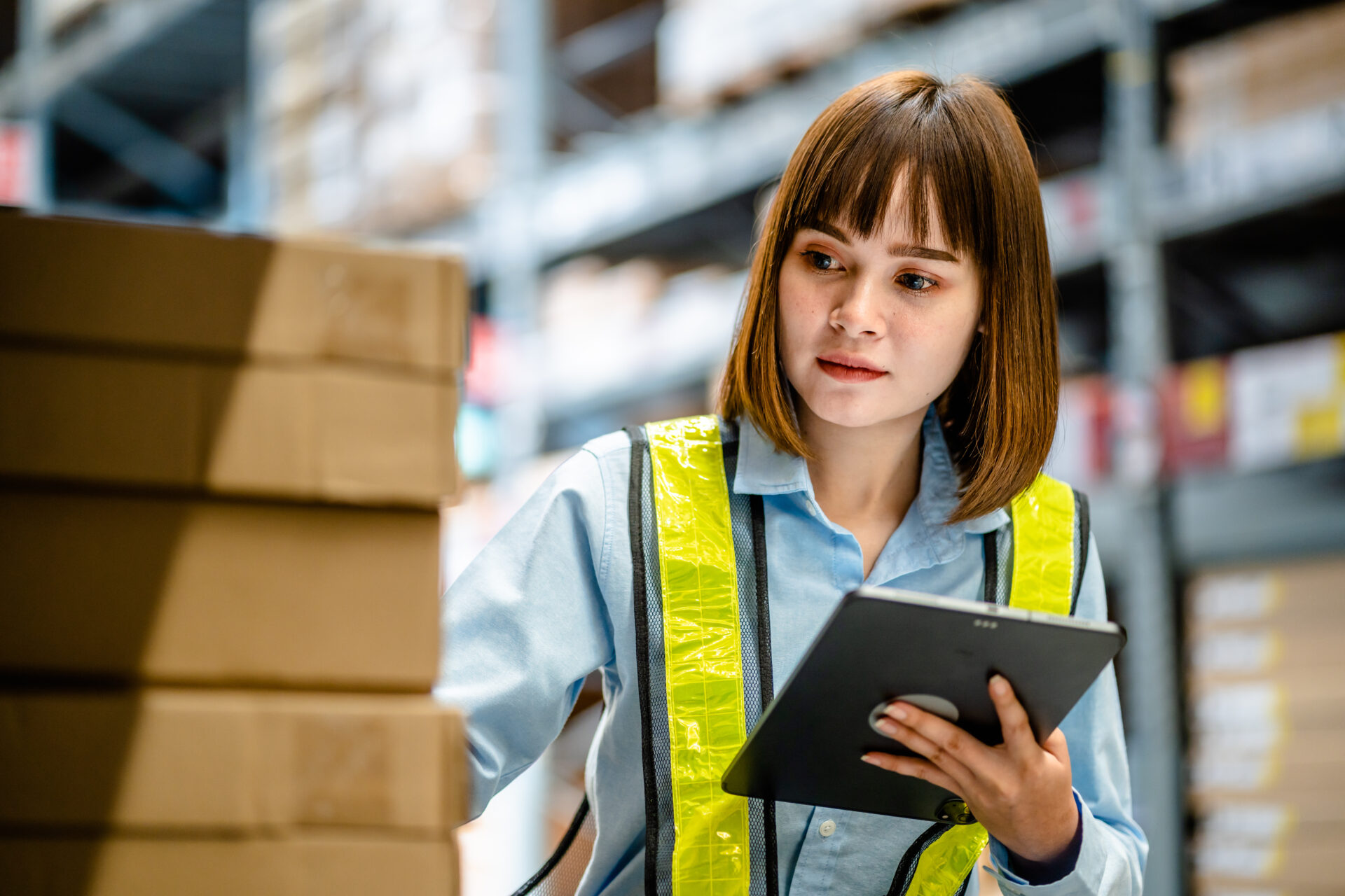 warehouse worker with a  tablet