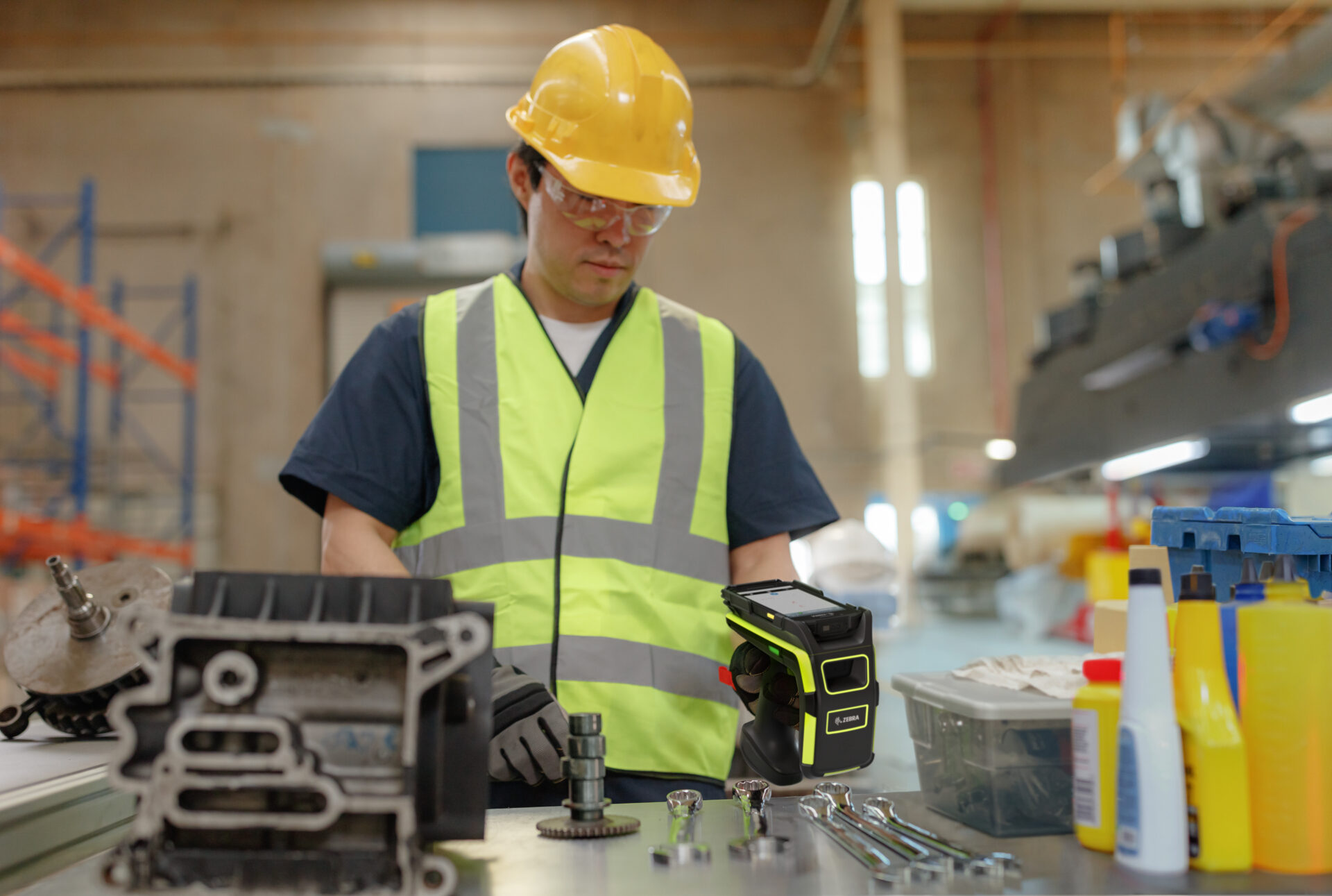 Warehuse team member using a handheld scanner